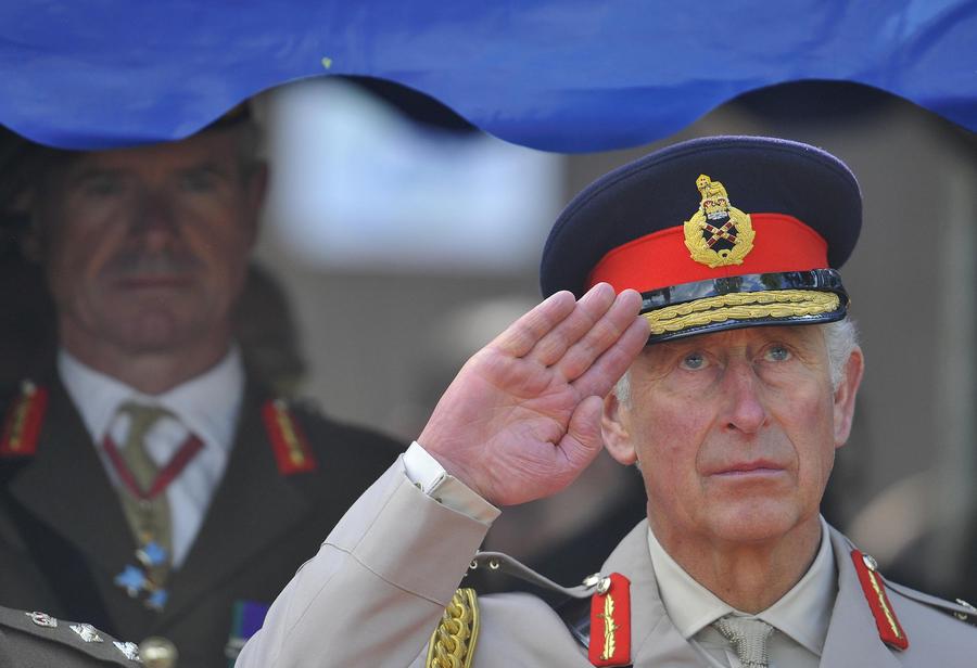 Le prince Charles assiste à une cérémonie commémorative à la mémoire des actions du Jour J de la 6e Division aéroportée britannique et du 1er Bataillon canadien de parachutistes au village de Bavent près des côtes normandes, le 5 juin 2014. [Photo/agences]