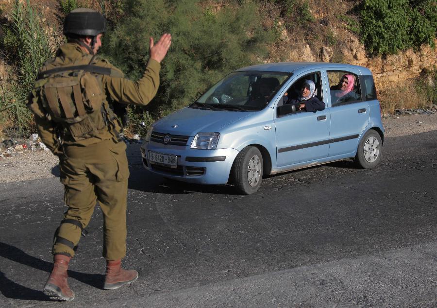 Israël arrête 80 Palestiniens en réponse à un enlèvement d'adolescents