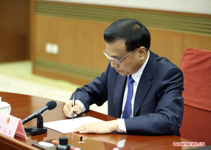 Le Premier ministre chinois Li Keqiang lors d'une réunion du Conseil des Affaires d'Etat, le 17 septembre 2014