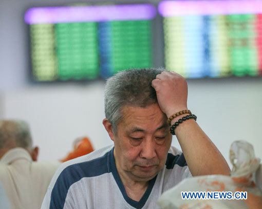 Les bourses chinoises plongent sous les 3.000 points