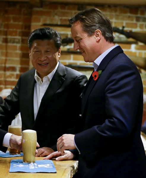 Xi Jinping et David Cameron devant un fish and chips