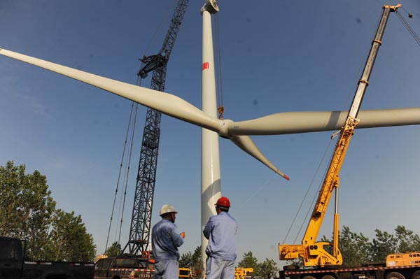 Un parc éolien en construction à Chuzhou, dans la province de l’Anhui. [Photo/China Daily]