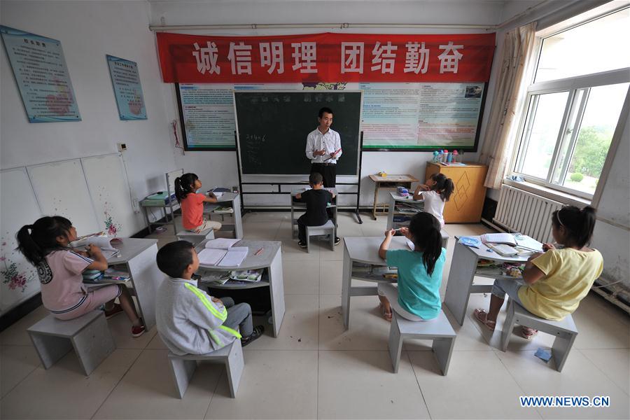 Ruban rouge dans le Shanxi : de jeunes élèves porteurs du VIH 