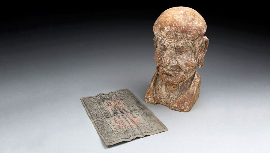 Un billet de banque caché dans une ancienne sculpture chinoise