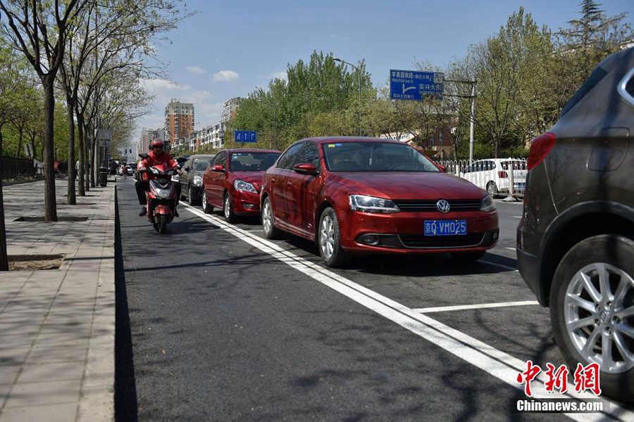 Beijing : une nouvelle mesure pour le stationnement encombré 
