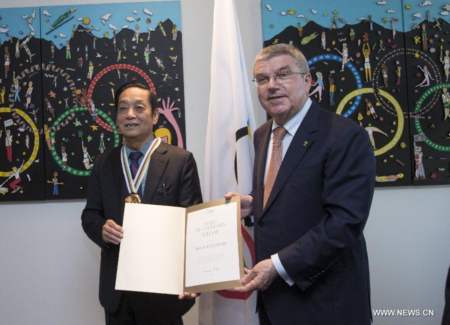 Un artiste chinois reçoit la médaille Pierre-de-Coubertin au siège du CIO à Lausanne
