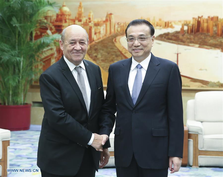 Le PM chinois rencontre le ministre français des A.E. à Beijing 