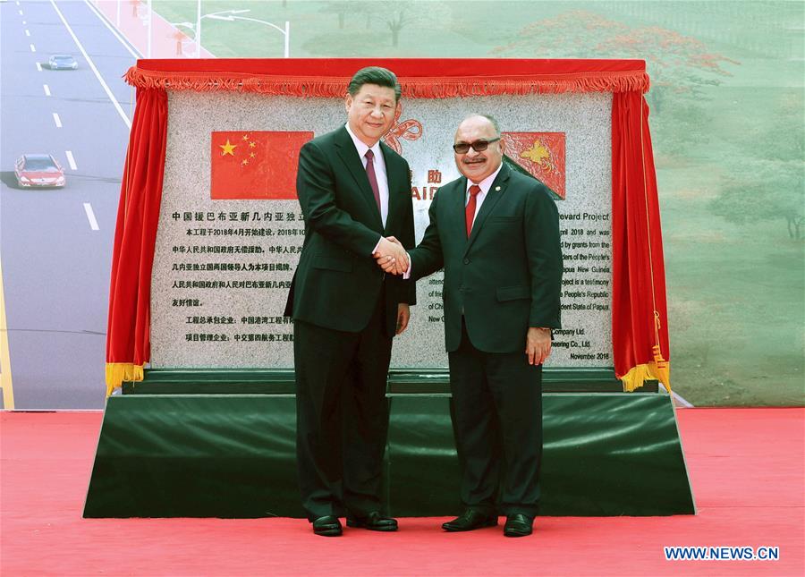 Xi et O'Neill assistent au transfert du boulevard de l'Indépendance construit avec la Chine en PNG