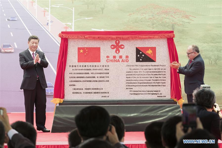 Xi et O'Neill assistent au transfert du boulevard de l'Indépendance construit avec la Chine en PNG