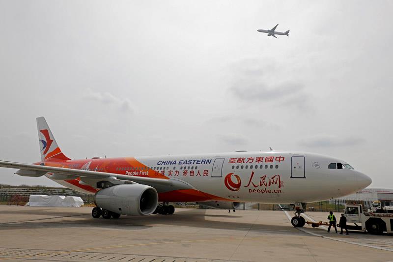 Premier vol réussi pour l'avion « Le Quoditien du peuple en ligne » entre Shanghai et Beijing