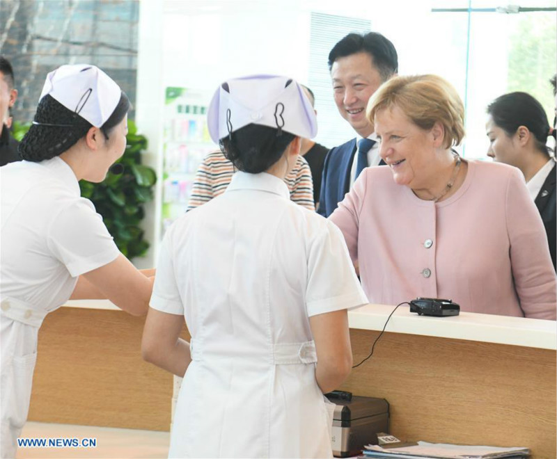 Visite de la chancelière allemande dans le centre de la Chine