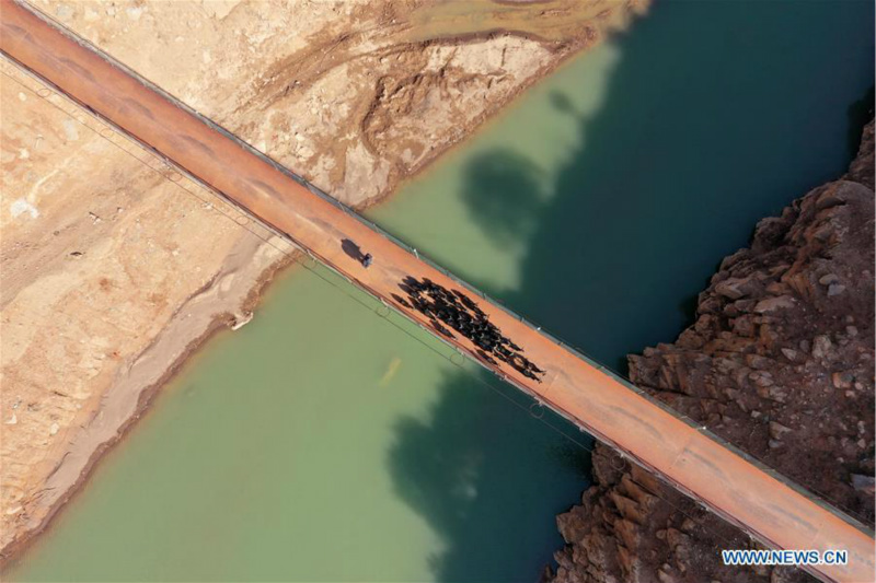 Le téléphérique remplacé par un pont le long de la rivière Niulan