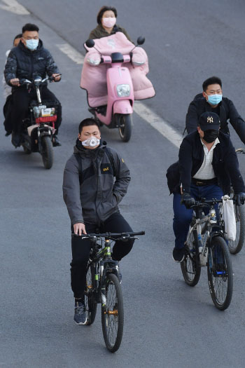 Les navetteurs de Beijing se mettent au vélo