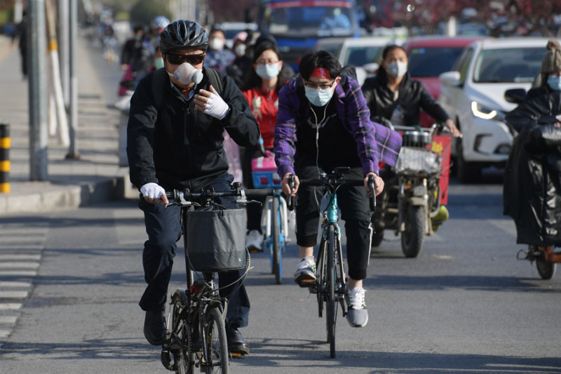 Les navetteurs de Beijing se mettent au vélo