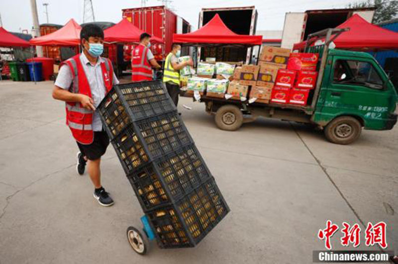 Réouverture progressive du marché de gros de Xinfadi à Beijing