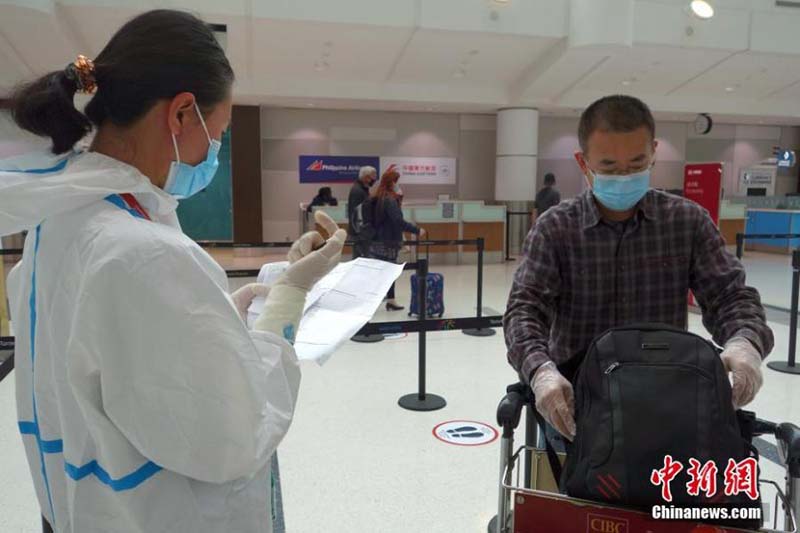 Les passagers aériens en provenance du Canada à destination de la Chine devront présenter des résultats négatifs de COVID-19