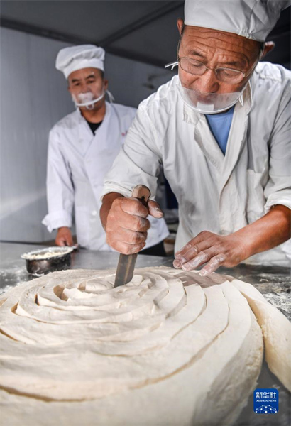 Shaanxi : un héritier du patrimoine culturel immatériel des nouilles creuses