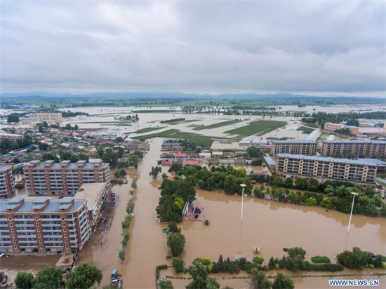 Photo aérienne prise le 5 août 2023 des zones inondées à Yanshou, district de la ville de Harbin, capitale de la province chinoise du Heilongjiang (nord-est). (Photo : Gu Jingkun)