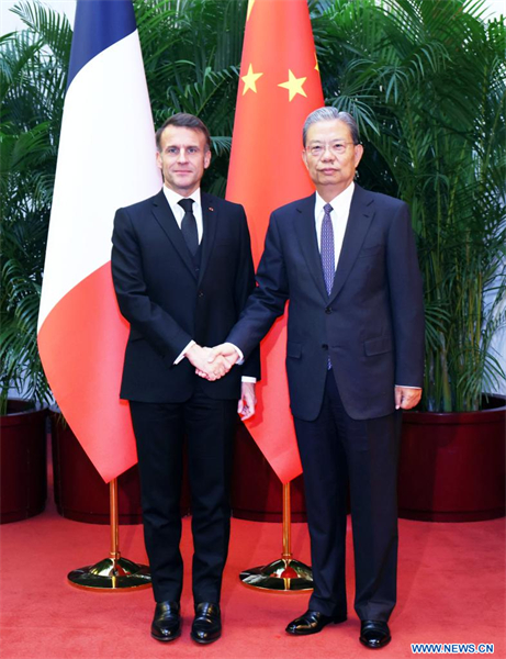 Le plus haut législateur chinois rencontre le président français