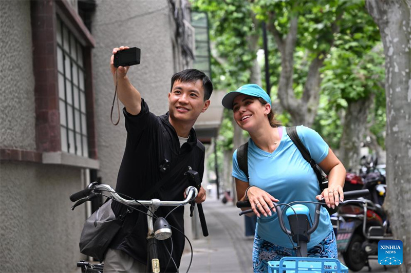 Histoire en photos d'un planificateur de tourisme entrant qui révèle aux visiteurs étrangers le véritable Shanghai