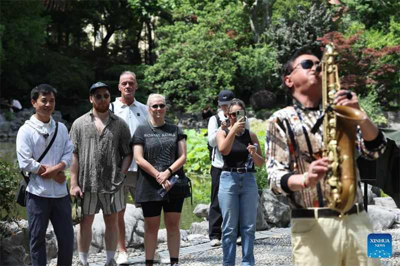 Histoire en photos d'un planificateur de tourisme entrant qui révèle aux visiteurs étrangers le véritable Shanghai