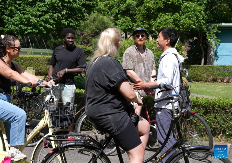 Histoire en photos d'un planificateur de tourisme entrant qui révèle aux visiteurs étrangers le véritable Shanghai