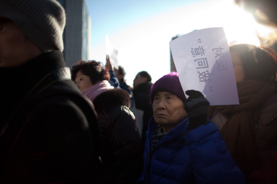Des manifestants contre une fraude de l'EIE du TGV Beijing – Shenyang (4)