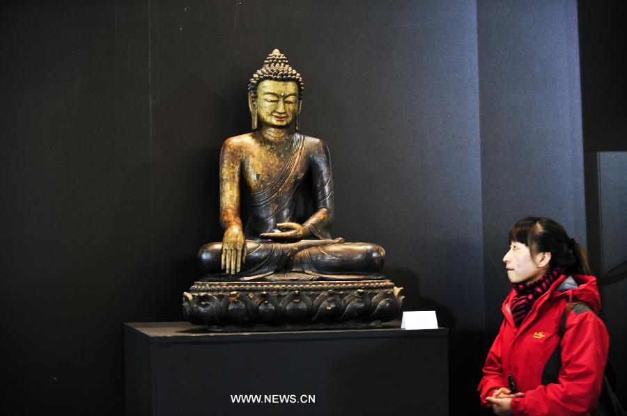 Une statuette exposée lors de la Foire internationale de l'art chinois de Beijing à Beijing, capitale chinoise, le 8 décembre 2012. 