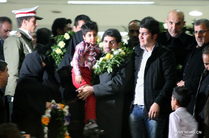 Les Iraniens libérés par les combattants syriens retournent à Téhéran (3)