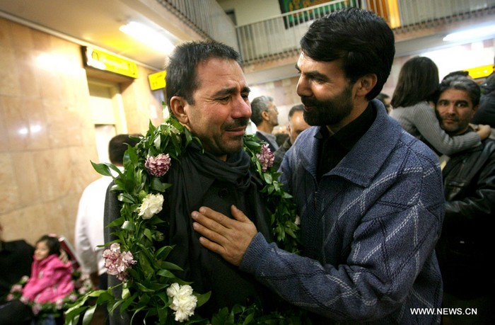 Les Iraniens libérés par les combattants syriens retournent à Téhéran
