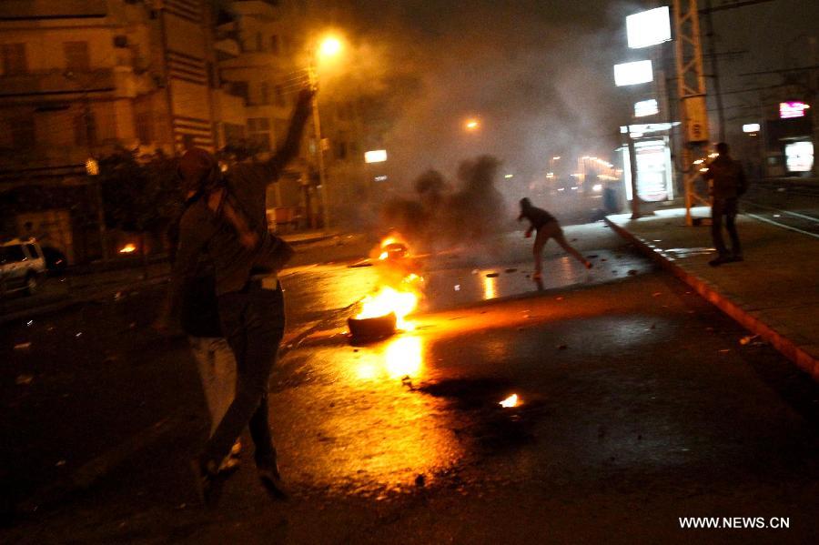 Egypte: affrontements entre manifestants et forces de sécurité prèsdu palais présidentiel au Caire  (10)