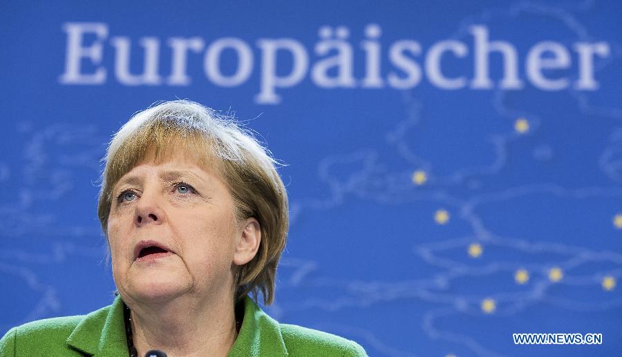 La chancelière allemande Angela Merkel participe à une conférence de presse après la première journée du sommet de l'UE à Bruxelles, capitale de la Belgique, le 14 mars 2013.