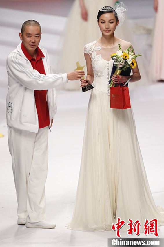 Le 30 mars 2013, Zhang Lingyue, la candidate n°12, a remporté le 8e Concours de Top-modèles chinois. (Photo : Sheng Jiapeng)