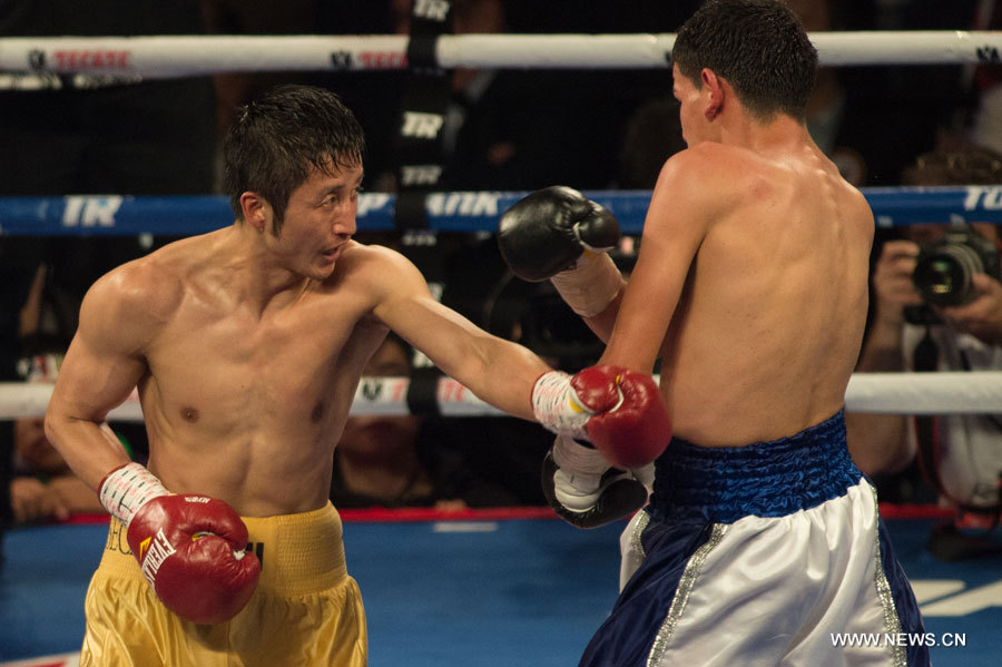 Boxe: Zou Shiming gagne son premier match chez les pros (3)