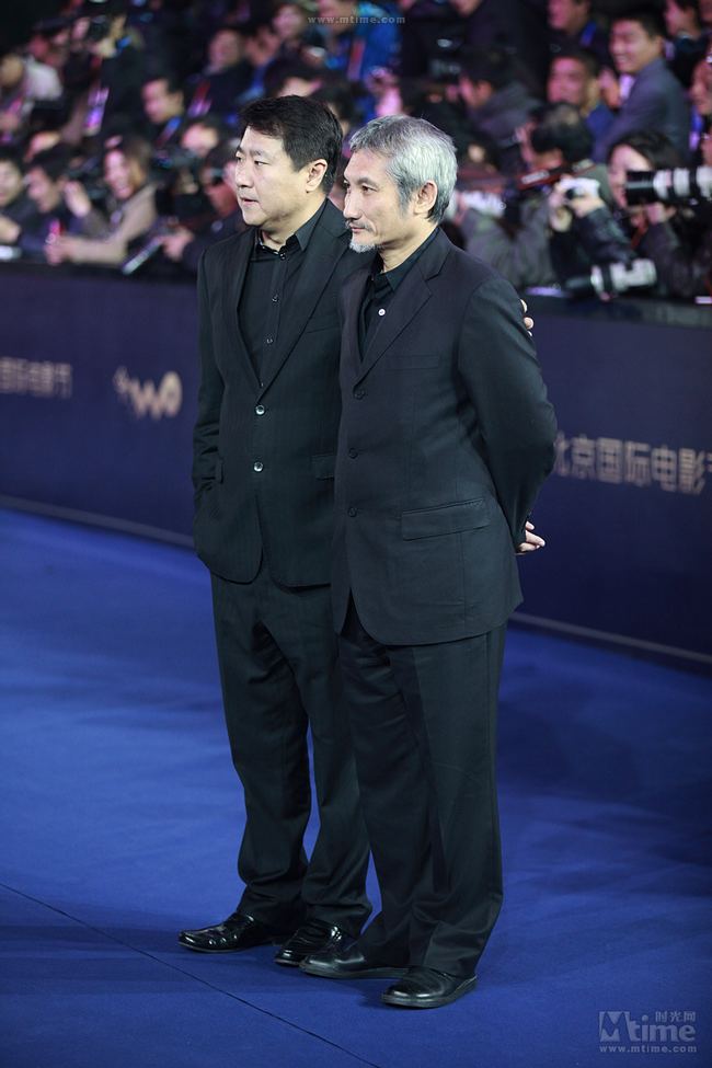 Le réalisateur hongkongais Tsui hark et le PDG de la société Bona Film Yu Dong