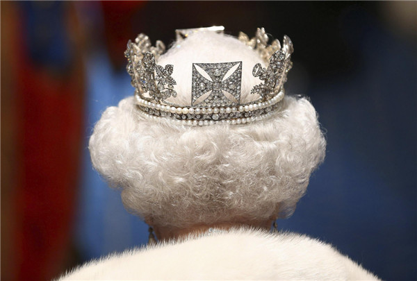 La Reine Elizabeth du Royaume-Uni arrive pour la cérémonie d'ouverture du Parlement, au Palais de Westminster à Londres, le 8 mai 2013. [Photo / agences]