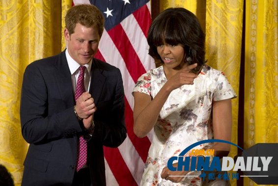Le prince Harry accueilli à la Maison Blanche par Michelle Obama