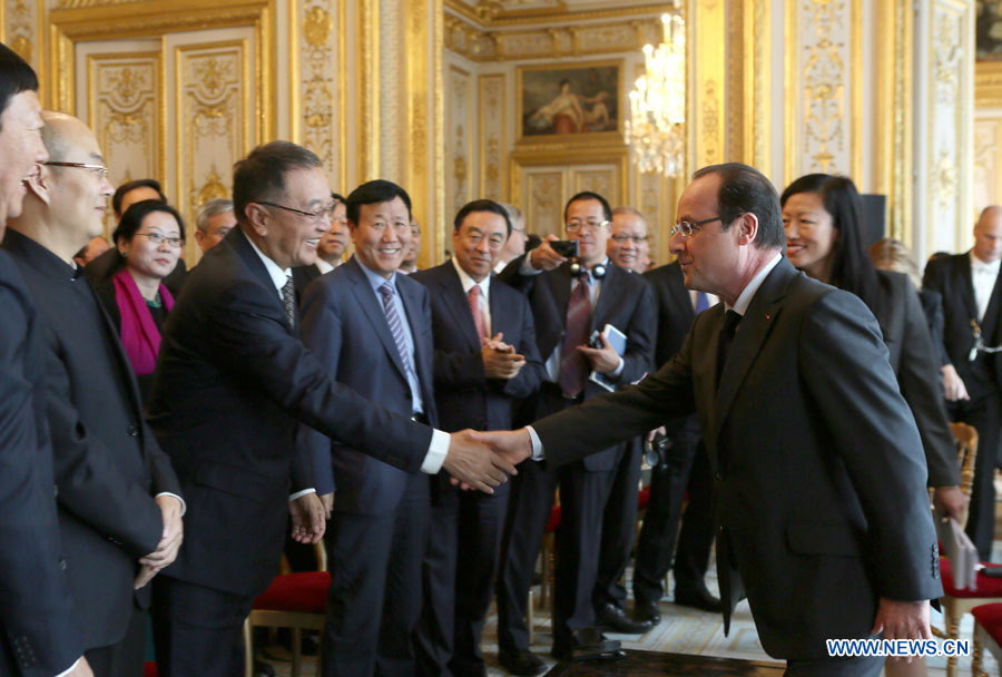 Le président français appelle à résoudre les litiges commerciaux entre Beijing et Bruxelles par la voie de la négociation 