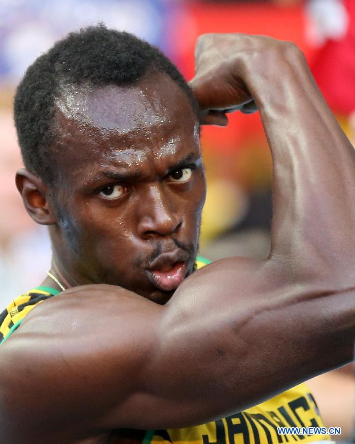Le sprinteur jamaïcain Usain Bolt a remporté samedi le titre de champion du monde du 200 m en 19 sec 66/100e aux championnats du monde d'athlétisme à Moscou. (Xinhua/Jia Yuchen)