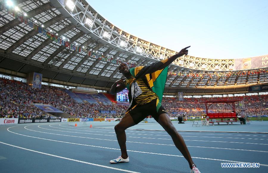 Le sprinteur jamaïcain Usain Bolt a remporté samedi le titre de champion du monde du 200 m en 19 sec 66/100e aux championnats du monde d'athlétisme à Moscou. (Xinhua/Jia Yuchen)