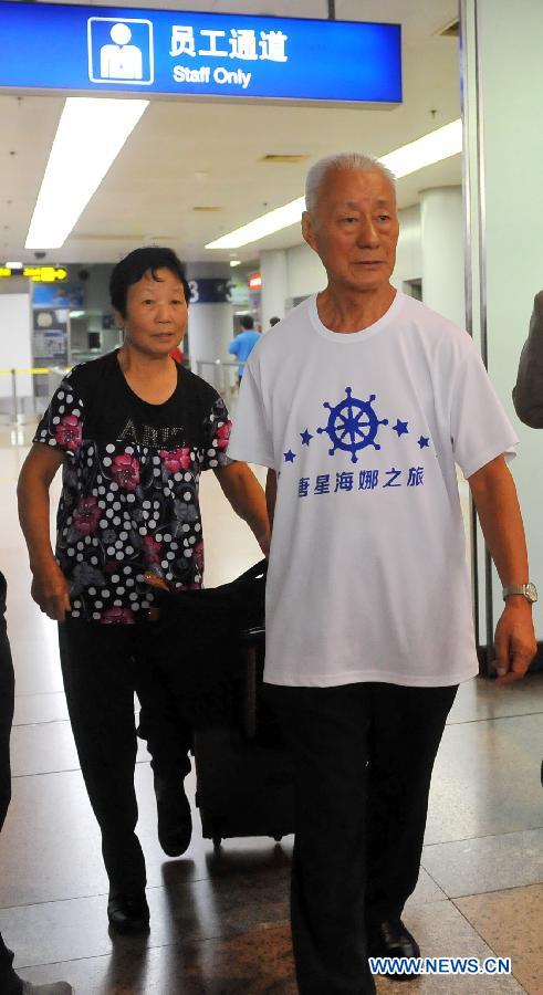 Retour de 1.409 passagers bloqués dans un bateau de croisière chinois en République de Corée (6)