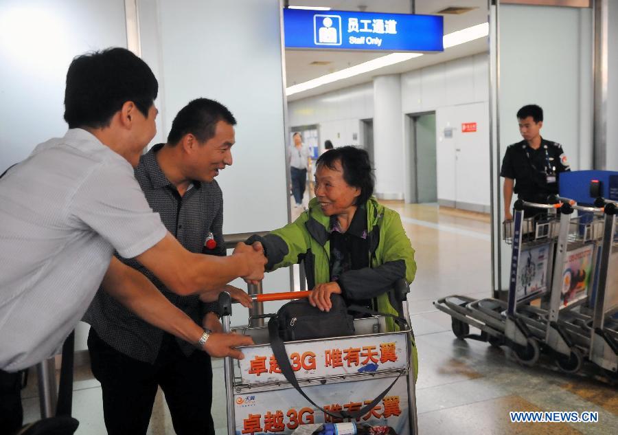 Retour de 1.409 passagers bloqués dans un bateau de croisière chinois en République de Corée (4)