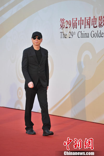 Le 28 septembre, le réalisateur Feng Xiaogang sur le tapis rouge de la 29e édition des Golden Rooster Awards.