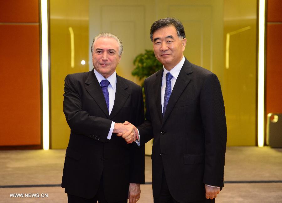 Le vice-Premier ministre chinois Wang Yang rencontre le vice-président du Brésil Michel Temer