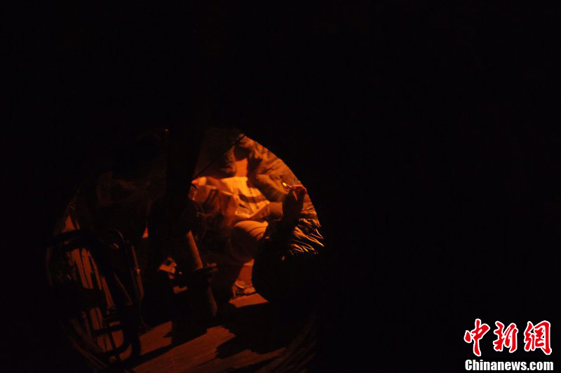 Beijing : un couple vit sous une bouche d'égout depuis des années (3)