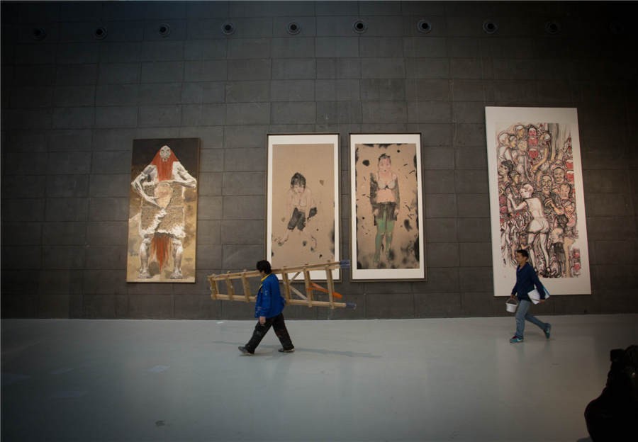 Des peintures signées par des enseignants de l'ACBC sont exposés à l'Académie Centrale des Beaux-Arts de Chine. [Photo fournie au China Daily]