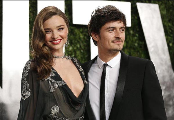 Orlando Bloom (à droite) et Miranda Kerr à la Vanity Fair Party des Oscars 2013 à West Hollywood, en Californie, le 24 février 2013. L'acteur britannique Orlando Bloom et Miranda Kerr, mannequin australien, se sont séparés après trois ans de mariage, a déclaré le couple en octobre 2013. [Photo / Xinhua / Agences]