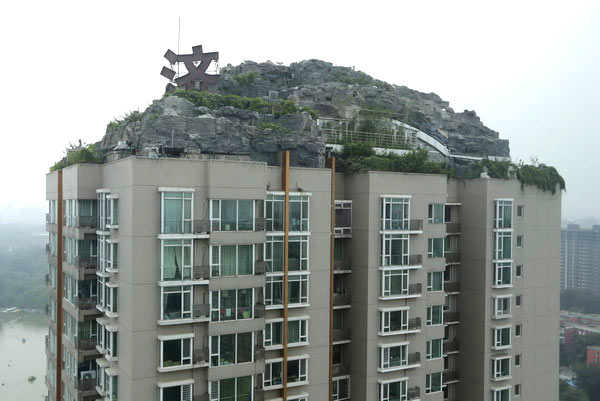 La plus grande villa illégale sur un toit démantelée à Beijing (4)