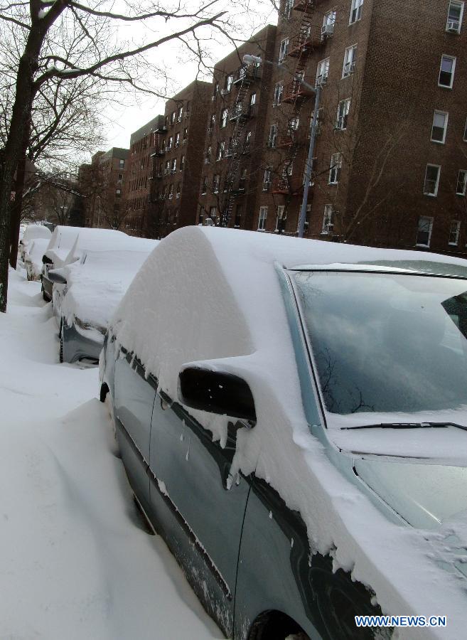 Photos: De fortes chutes de neige frappent New York (5)