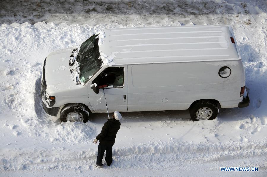 Photos: De fortes chutes de neige frappent New York (6)